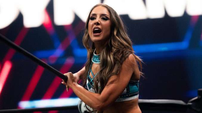 Britt Baker reacts to 'book the women's division better' sign from 7/26 ...