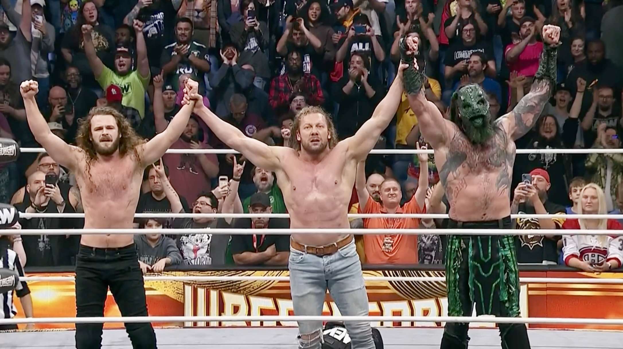 Kenny Omega helps Jurassic Express fend off attack after they defeat ...